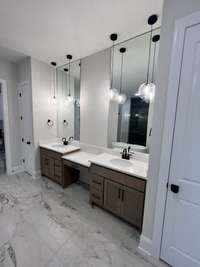 Split vanity with seating area