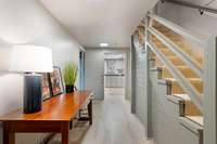 Downstairs hallway to garage and laundry room