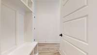 Mudroom/dropzone as you enter from garage.