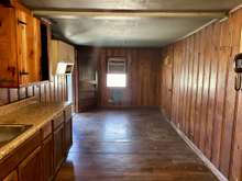 kitchen with eat-in dining area. screened porch off dining area