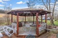 Escape to the outdoor gazebo, a tranquil retreat where you can unwind and enjoy the beauty of your surroundings in comfort! 1028 Cook Rd  Liberty, TN 37095