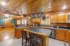 Step into this inviting kitchen where culinary dreams come to life! Featuring a double basin sink and a convenient pot rack overhead, meal prep becomes a breeze. 1028 Cook Rd  Liberty, TN 37095