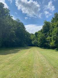 Another large pasture area leading you to the spring fed pond!!