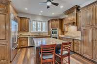 Stunning kitchen with gorgeous cabinetry and top of the line appliances that include Thermador and Subzero.