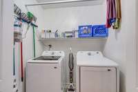 Main level laundry room off the main hallway.