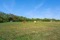 Flat useable acreage for animals, gardening, and recreation.