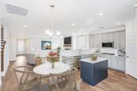 Kitchen A and dining breakfast room shown here. Kitchen B features an open flow from kitchen to great room with large island.