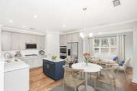 Kitchen A and breakfast room with morning room shown here. Kitchen B features an open flow from kitchen to great room with large island.