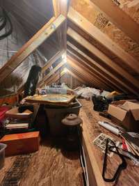 One of two attic spaces with additional storage, a hidden gem, the perfect solution for maximizing your home's storage. This area has a world of possibilities for organizing and decluttering your home. Dual air conditioning units to cool the home.