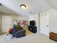 Bonus room is large enough to use for separate spaces.