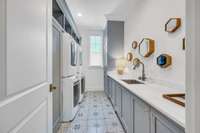 DOUBLE washer/dryers on main floor makes laundry a dream! Option to adapt the second floor storage closet for third set of washer dryers.