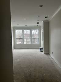 Large windows and lots of light in the primary bedroom.