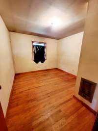 Bedroom 1 Has a Window and sand and finish hardwood floors