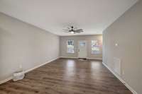 LIVING ROOM SPACE WITH LAMINATE FLOORS