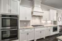 Gas stove with beautiful hood, double ovens