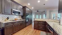 kitchen remodeled in 2016.  Cabinets and built in pantry have slide out drawer and other specialty features