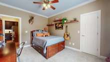 Bedroom 4 gets lots of natural light and has walk in closet