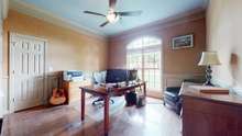 Bedroom 2 is being used as an office.  It gets lots of natural light, has built in bookcases and walk in closet