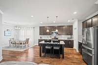 Beautiful kitchen with custom cabinets, gorgeous countertops and stainless appliances.