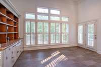 A second dining area overlooks the rear deck and back yard.