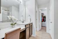 ...your master bathroom where you will find a vanity counter, a separate water closet...