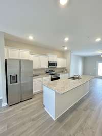 Your kitchen comes with all stainless steel appliances, granite countertops, & under cabinet lighting.