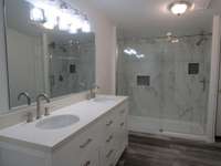 Closer look at the Master Bath!!! The shower is real tile!!