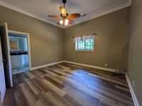 Bedroom #4, considered owners suite, with private bath and large walk-in closet.