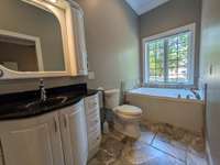 Large tub with separate shower