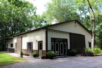 Barndominium with 4 bedrooms and 3 baths. Large open living that will work for Air B&B common area, reception for events or large living for owners.
