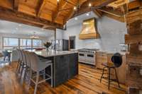 Entertaining is easy in this beautiful oversized kitchen.