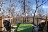 A private porch off the bonus room to enjoy the surroundings.