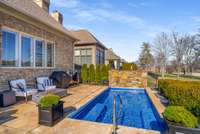 Just look at that pool! This is a rare and desirable feature that can be enjoyed year round.