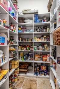 There is a large pantry in the kitchen that is also prewired for an elevator shaft.