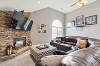 This bonus room also has a gas fireplace with stone surround and built in speakers.