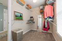 Look at the size of this walk in closet in this secondary bedroom.