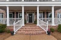 Sit and enjoy the rocking chair front porch!