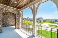 You will enjoy front porch living at its finest from your covered porch with tongue and groove ceilings perched on a majestic lot with stunning views of the community.