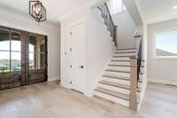 Foyer - gorgeous  light colored hardwood floors, custom lighting from Grahams lighting in Franklin, TN