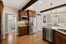 Kitchen With Built In Microwave, Pantry And Refrigerator To Remain