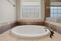 Relax After A Long Day In This Garden Tub Located In Primary Bath