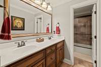 Full Bath Located On Second Level With Double Vanities And Tile Flooring