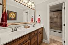 Full Bath Located On Second Level With Double Vanities And Tile Flooring