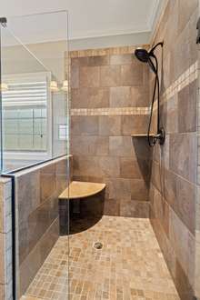 Large Tile Shower In Primary Bathroom
