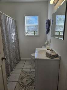 THE PRIVATE BATH WITH UPDATED DECOR....