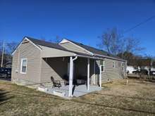 THE RIGHT SIZE COVERED PATIO ON THE CORNER.