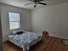 ANOTHER BEDROOM WITH A CEILING FAN AND READY TO MOVE INTO....