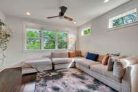 Outdoor view from this light-filled Living Room. 2-inch blinds remain.