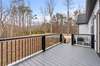 Back deck with trex decking over looking the back yard.