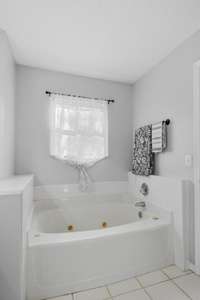 Unwind in this oversized jetted tub!